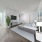 spacious bedroom with hallway access